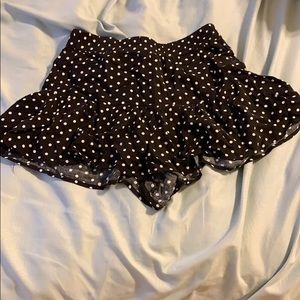 Black polka dot shorts.